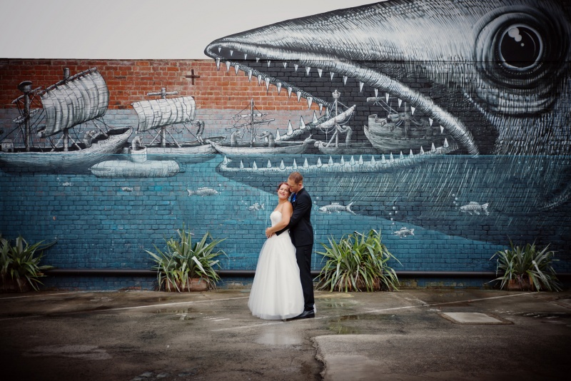 Nicola & Richards Wedding day at The Dunedin Club, Dunedin, NZ. Using the awesome graffiti in the city.