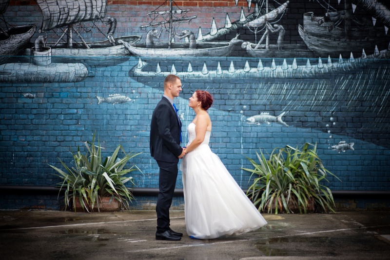 Nicola & Richards Wedding day at The Dunedin Club, Dunedin, NZ. Using the awesome graffiti in the city.